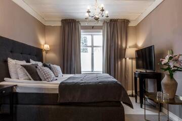 Фото номера Двухместный номер с 1 кроватью и террасой Отель Bridget Inn г. Наантали 5