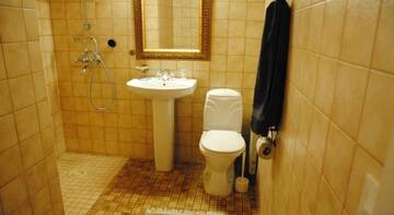 Фото номера Двухместный номер с 2 отдельными кроватями, вид на сад Отель Hotel Villa Antonius г. Наантали 4