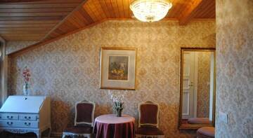 Фото номера Двухместный номер с 2 отдельными кроватями, вид на сад Отель Hotel Villa Antonius г. Наантали 2