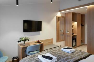 Фото номера Номер с кроватью размера «queen-size» и балконом Отель Naantali Spa Hotel г. Наантали 5